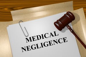 A document with the words 'Medical Negligence' written on it.