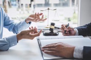 NO WIN NO FEE SOLICITOR DISCUSSES CANCER MISDIAGNOSIS COMPENSATION CLAIMS WITH HIS CLIENT