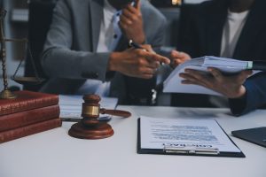 Solicitors examining evidence for a medical negligence compensation claim.
